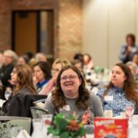 people at luncheon tables